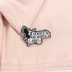 Creative enamel brooch with dragon silhouette and funny text on pink denim collar