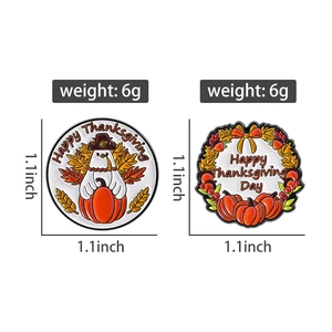 Detail view of 1.1-inch Happy Thanksgiving enamel pins with turkey and pumpkin motifs