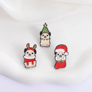 Detailed view of three festive pug enamel pins with Christmas tree and reindeer antler themes