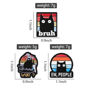 Detailed view of three funny black cat enamel pins with sizes and weights on white background