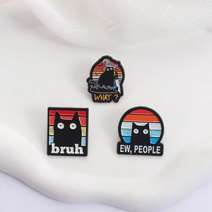 Three-piece black cat enamel pin set featuring funny meme designs on a white stand