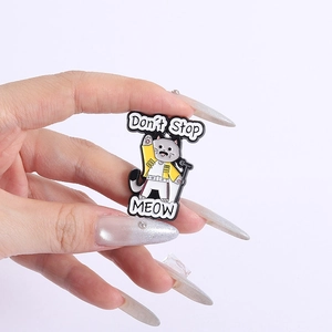 Cartoon cat Freddie Mercury enamel pin with Don't Stop MEOW motivational quote