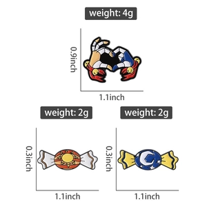 Detailed size and weight specs for sun and moon enamel pins set on white background