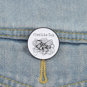 Minimalist enamel brain thoughts brooch with I feel Like This text on denim jacket