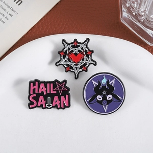 Three-piece gothic enamel pin set featuring Baphomet and Hail Satan text on white ceramic