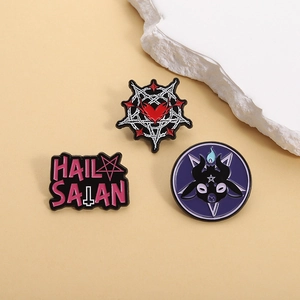 Three gothic enamel pins featuring Baphomet and Hail Satan designs for clothing decor