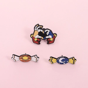 Halloween enamel pins set featuring skeleton heart hands with sun and moon candy designs