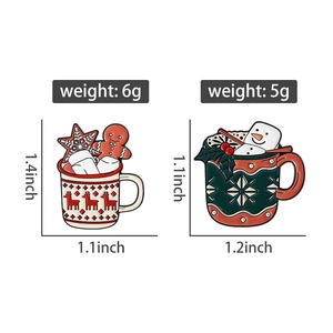 Detailed view of Christmas mugs enamel pins with snowman and reindeer patterns