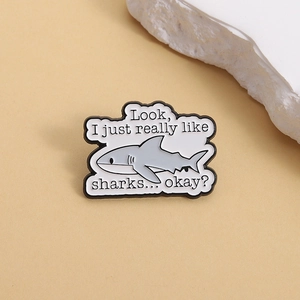 Funny shark enamel pin with 'I just really like sharks' text for bags and clothing