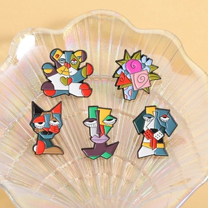 Artistic Picasso style flower and animal enamel brooch set in colorful shell tray
