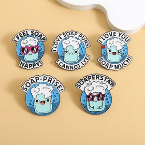 Cute cartoon blue soap enamel pins set with creative funny puns on a yellow background