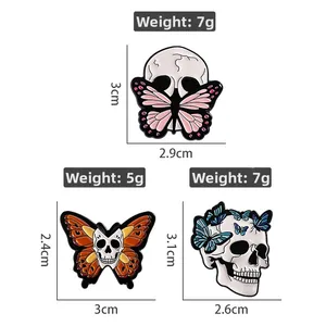 Detailed view of Gothic skull butterfly enamel pins with dimensions and weight specs