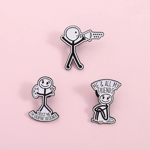 Drei kreative minimalistische Strichmännchen-Emaille-Pins mit Grafikdesigner-Motiven