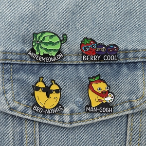 Creative fruit enamel pins set featuring Watermeowlon and Berry Cool designs on denim jacket