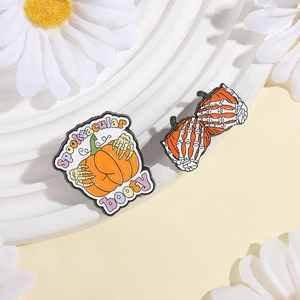 Halloween pumpkin and skeleton hand enamel pins set with Spooktacular booty slogan