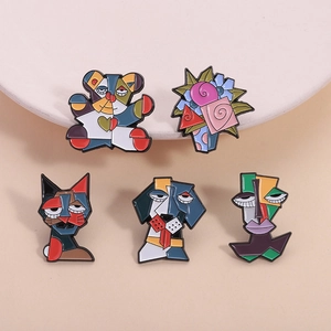 Artistic Picasso-style colorful enamel brooch set featuring abstract animals and floral shapes