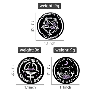 Detail view of feminist enamel pins showing dimensions and witchy mystery symbols