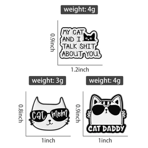 Detailed view of enamel cat pins with humor quotes and precise size measurements