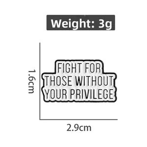 Detail view showing dimensions of black and white enamel pin with inspirational quote