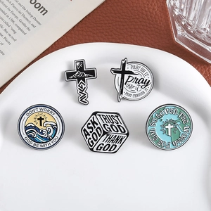 5-piece set of black and white religious enamel pins with inspirational quotes on white ceramic
