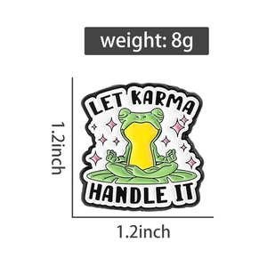 Close-up of green frog enamel pin showing weight 8g and size 1.2 x 1.2 inch dimensions