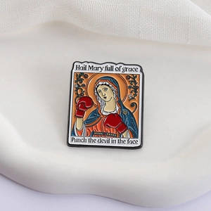 Funny Boxing Mary enamel pin featuring Hail Mary text on a white minimalist display