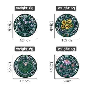 Set of four floral enamel pins with Spanish motivational quotes and 1.2-inch size markings