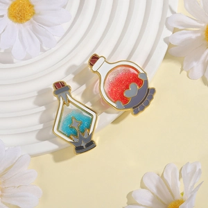 Broches mignonnes en émail en forme de fiole de potion rouge et bleue avec bord doré