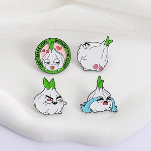 Cartoon garlic enamel pin set with funny expressions on a textured display base