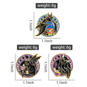 Detail of gothic enamel pins featuring black cat, owl, and bat with magic accessories
