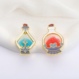Broches émaillées flacon de potion magique avec poussière d'étoile et cœur rose