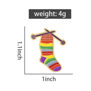 Rainbow knit sock enamel pin dimensions showing 1.1 inch height and 4g weight detail