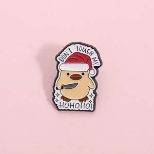 Funny Christmas yellow chick enamel pin with Santa hat and humor text on pink background