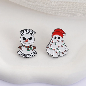 Funny Christmas snowman and ghost enamel pin set with festive holiday light details