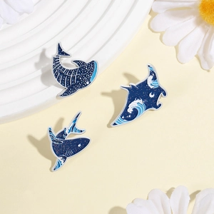 Marine life enamel pin set featuring blue whale and shark with wave patterns
