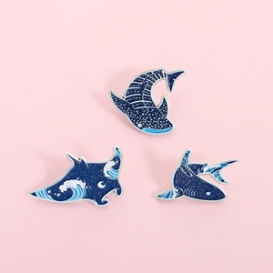 Three-piece ocean set featuring whale shark and ray enamel pins with starry sky waves