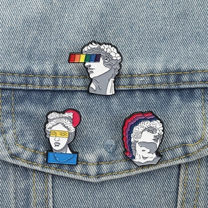 Artistic retro classical sculpture enamel pins with rainbow pop art on denim jacket