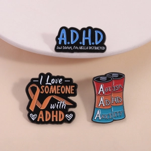 Neurodiversity enamel pins set featuring ADHD and autism awareness battery design
