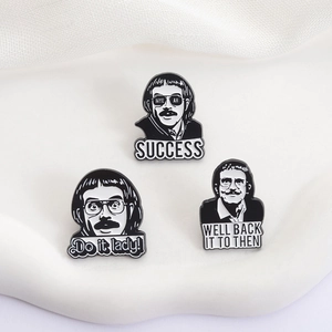 Three minimalist black and white enamel pins with artistic portraits and success quotes