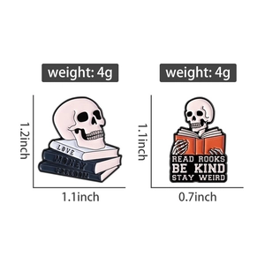 Detail of skull enamel pins with motivational quotes and books on white background