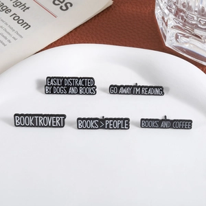 Funny book lover enamel pins set with reading quotes on white ceramic dish background