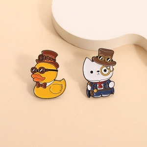 Steampunk style yellow duck and white cat enamel pins with gentleman accessories