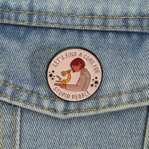 Cute microscope enamel pin featuring a scientist and a funny science quote on denim jacket