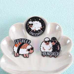 Three cute enamel pins set featuring SpaceSheep, SuSheep, and FriendSheep on shell plate