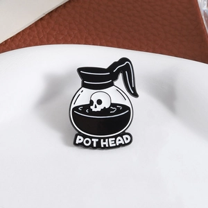 Gothic POT HEAD coffee pot enamel pin with skull design on white ceramic plate