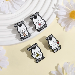 Set of four cute white cat enamel pins with funny puns like More Espresso and Meowstarda