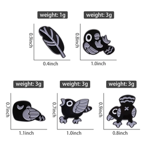 Detailed size chart showing black and white cartoon bird and feather enamel pins