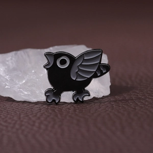 Punk style black and white enamel bird brooch with creative metal badge design