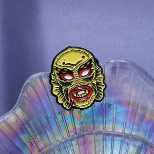 Classic Creature from the Black Lagoon enamel pin with green finish and red lips
