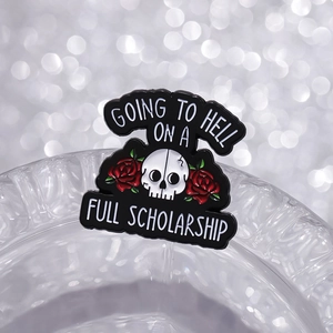 Skull and red rose enamel pin with Going To Hell On A Full Scholarship slogan